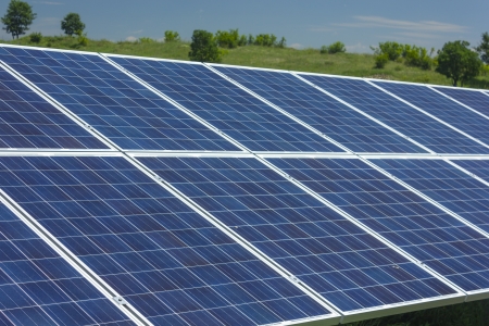 Electric photovoltaic solar panels cells on a fieldの写真素材