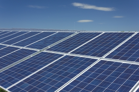 Electric photovoltaic solar panels cells on a fieldの写真素材
