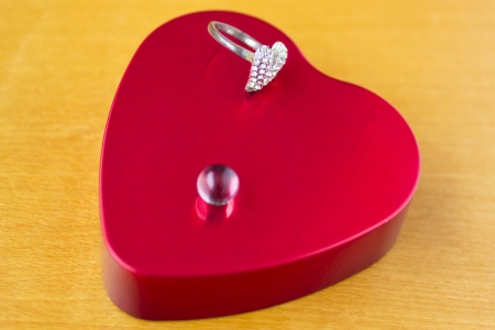 Symbol of hearth, ring and pearlの写真素材