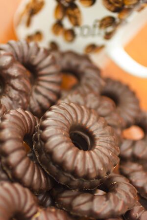 Coffee cup and chocolate biscuitsの写真素材