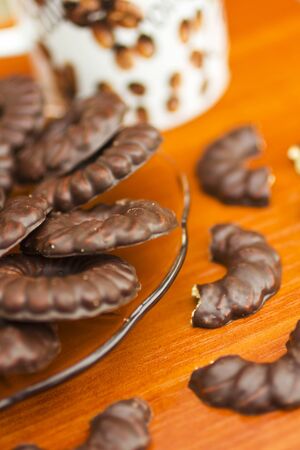 Coffee cup and chocolate biscuitsの写真素材