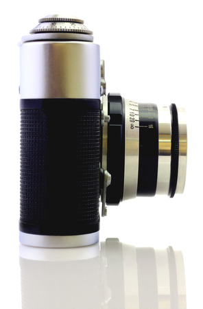 Retro camera isolated on whiteの写真素材