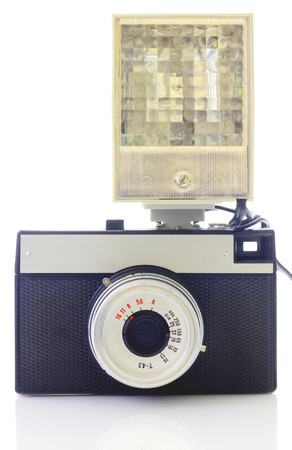 Retro camera and flash isolated on whiteの写真素材