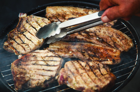 Steaks on barbecueの写真素材
