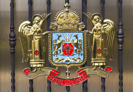 Metal door with Coat of Arms of Romanian Orthodox Church in Bucharest, Romaniaのeditorial素材