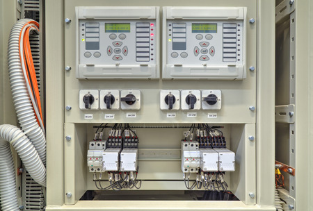 Electrical control panel with electronic devices in modern electrical substation