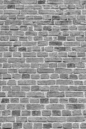 Stylish brick wall background in black and whiteの写真素材