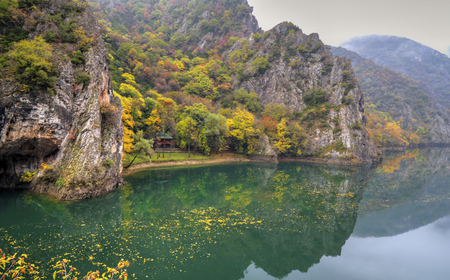 Beautiful landscape with river in the mountain and colorful autumn forestの写真素材