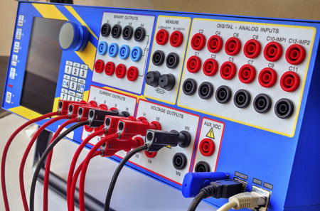 Modern electronic device for relay protection testing and commissioning closeup