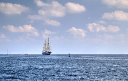 Sailing ship in the blue sea