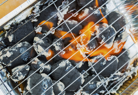 Burning flames and barbecue closeupの写真素材