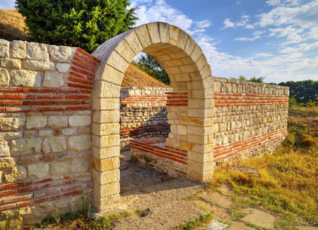 Entrance and stone wall of ancient sanctuaryの写真素材