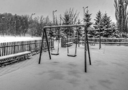 Winter playground in black and whiteの写真素材
