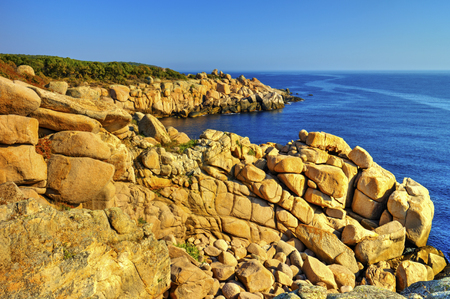 Beautiful landscape with rocky shore and blue seaの写真素材
