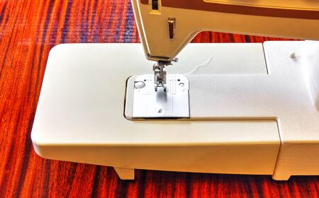 Modern sewing machine close up view