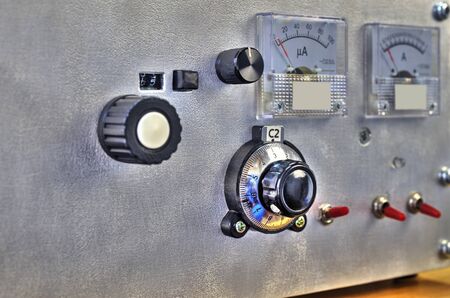 Front panel of a high frequency power amplifier with vacuum tubes close up viewの写真素材