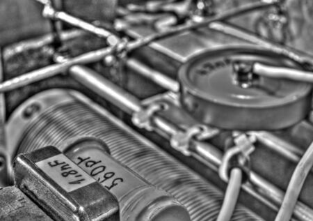 Inside view of high frequency power amplifier with capacitors, coils and other components in black and whiteの写真素材