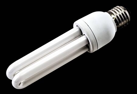 Energy saving bulb isolated on black background close up viewの写真素材
