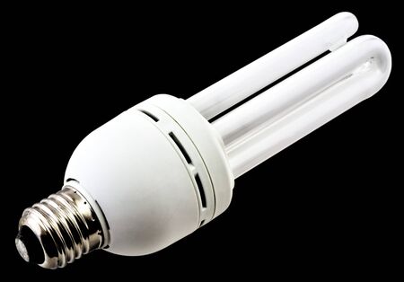 Energy saving bulb isolated on black background close up viewの写真素材