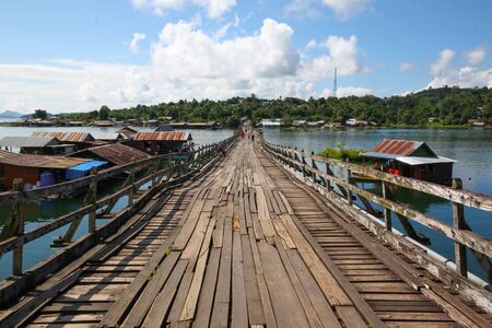 An old wooden bridge in Sangklaburi, Thailandの写真素材