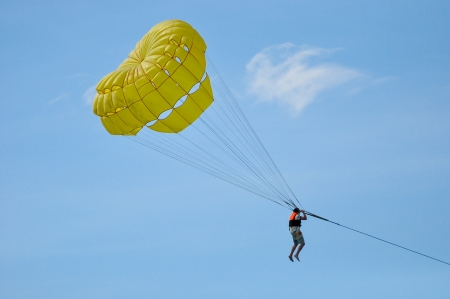 Parasailing in summer with cool breeze from the sea in Phuket, Thailandの写真素材