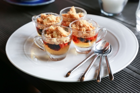 Colorful jelly with assorted fruits in a small glass