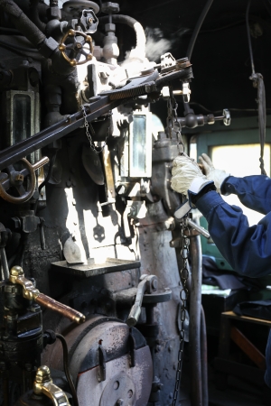 Stream train worker inside the cockpitの写真素材