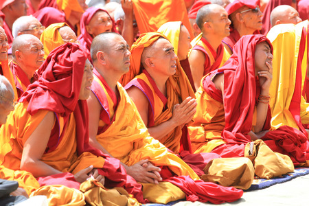 LEH, INDIA - AUGUST 5, 2012: Unidentified buddhist monks and lamas attend His Holiness the 14th Dalai Lama teaching on August 5, 2012 at Shewatsel Grounds, Leh, Jammu and Kashmir, India.のeditorial素材