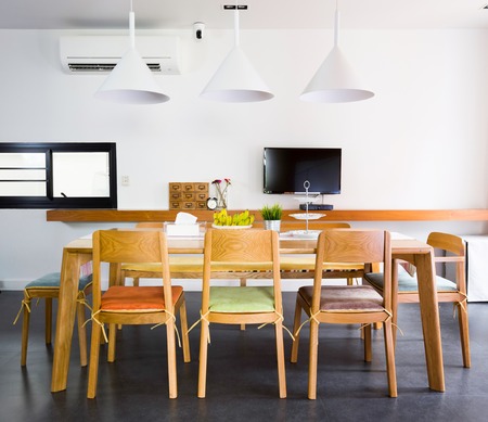 Contemporary dinning room with wooden tables and chars