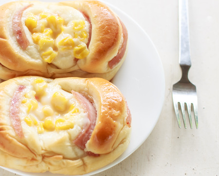 sweet bread with ham and cornの写真素材