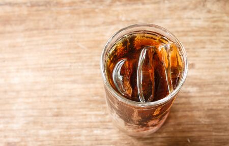 Glass of cola background textureの写真素材
