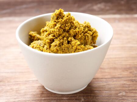 green curry paste in white cupの写真素材