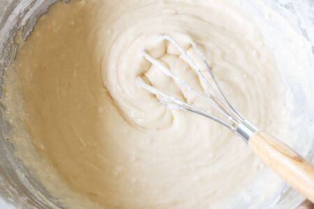 mixed yolk eggs, flour and sugar prepare for baking cake or bake