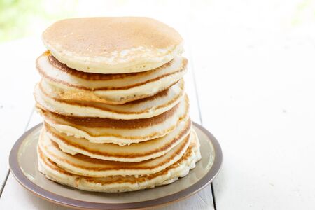 Appetizing pancakes on plateの写真素材