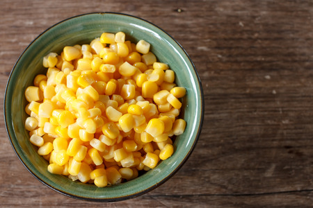 sweet corn in green cupの写真素材