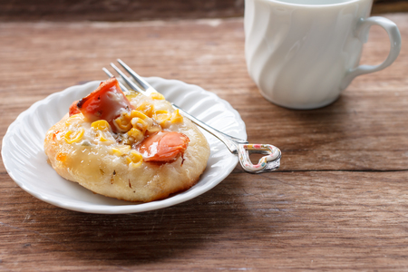 sweet bread with corn and sausagesの写真素材