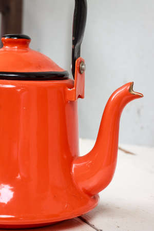 vintage orange tea potの写真素材