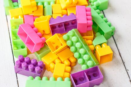 Plastic building blocks on tableの写真素材