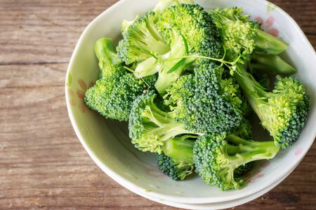 organic broccoli cutting prepare for cookingの写真素材