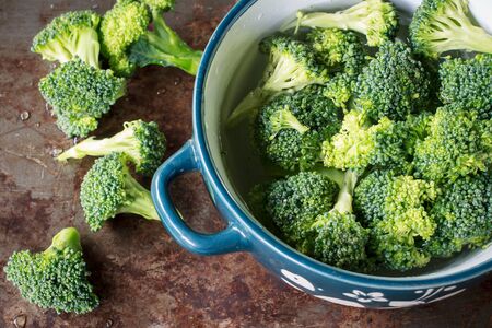 organic broccoili cutting prepare for cookingの写真素材