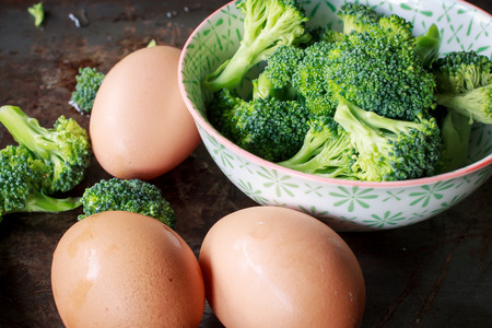 organic broccoili cutting prepare for cooking with eggsの写真素材