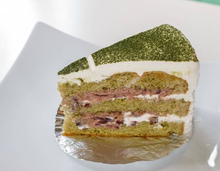 green tea cake serve on white plate