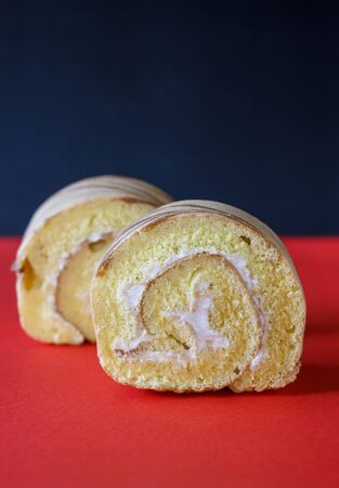 sweet vanilla cream roll cake in tea timeの写真素材
