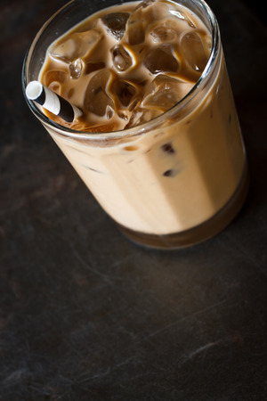 Glass of Cold Iced Coffee put on grunge tableの写真素材
