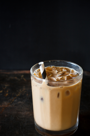 Glass of Cold Iced Coffee put on grunge tableの写真素材