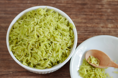 pounded unripe rice, green rice Thai style, serve on white plateの写真素材