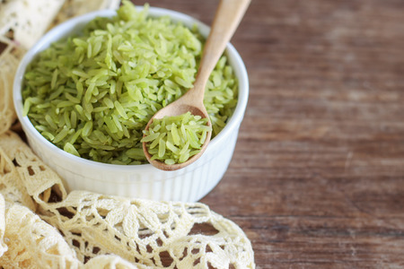 pounded unripe rice, green rice Thai style, serve on white plateの写真素材