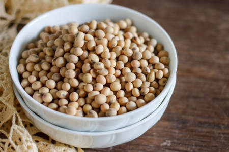 Soy beans in white cupの写真素材
