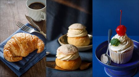 Assorted sweet bakery: french croissants, vanilla cupcake and swedish bun with cream.の写真素材