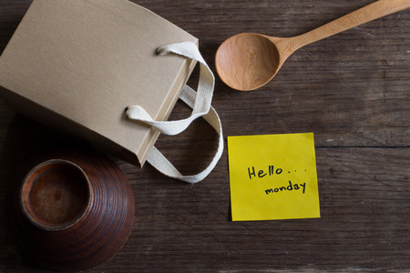 Hello monday with paper gift, image soft focus and dark tone.の写真素材